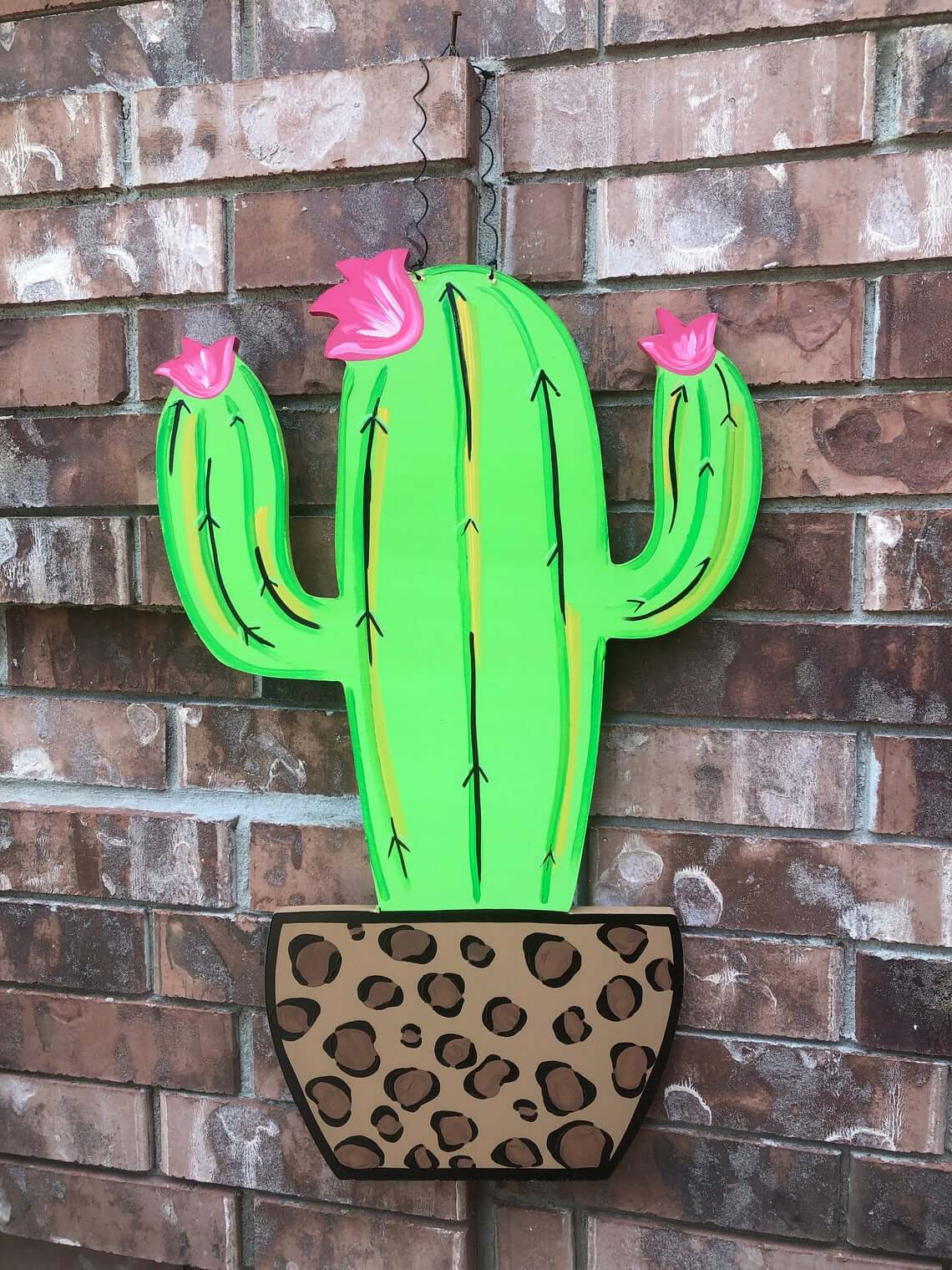 Prickly Cactus and Flower Sign Seated in Cheetah Print Planter