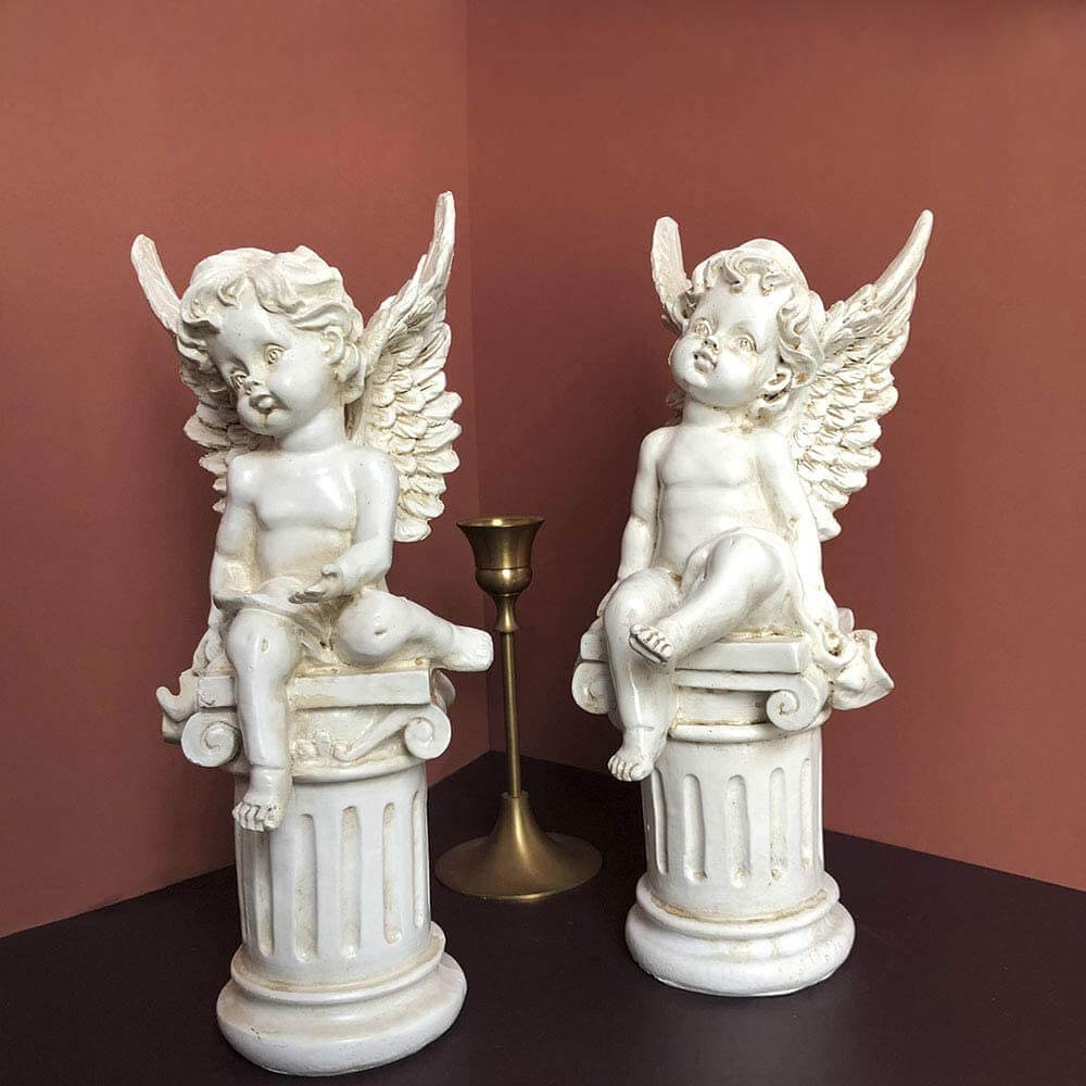 Pretty Pair of Cherubs Perched on Pillars