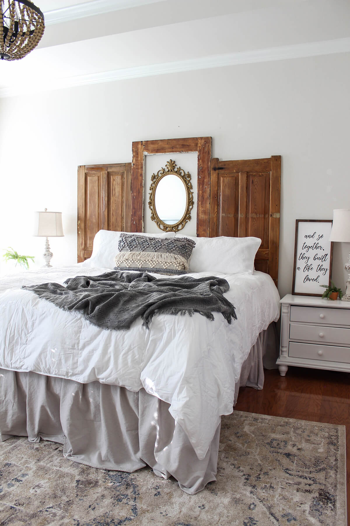 Stunning Wood Headboard Featuring an Antique Mirror