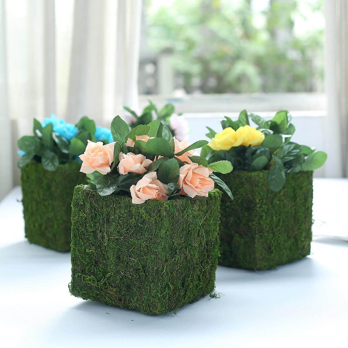 Natural Inspiration With Moss Covered Planters