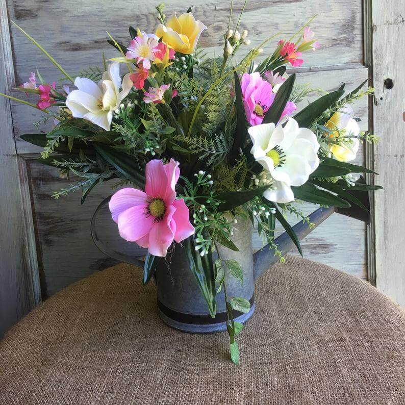 Watering Can Filled Flower Arrangement