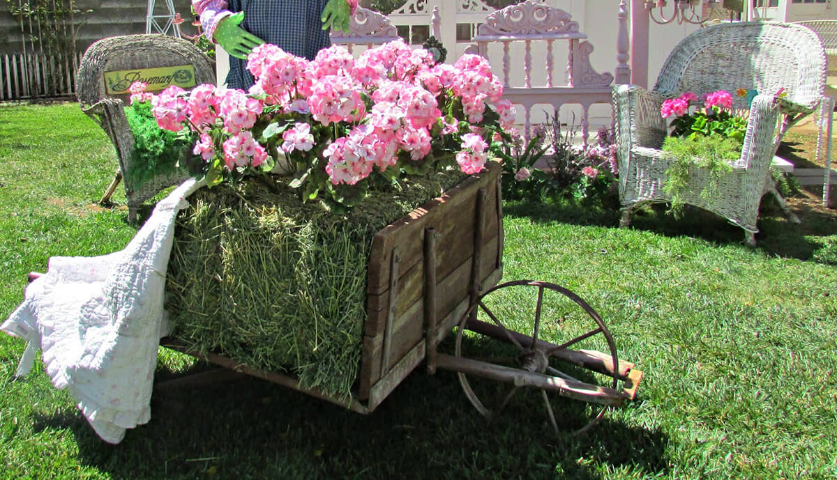 Vintage Hay Wheelbarrow Decorated for Spring