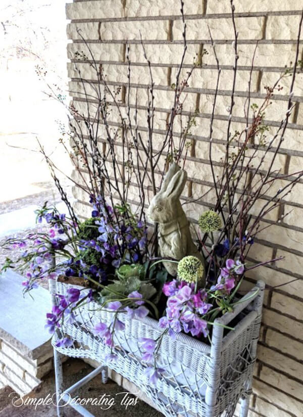 Wicker Planter Stand with Rabbit Statue and Floral Display