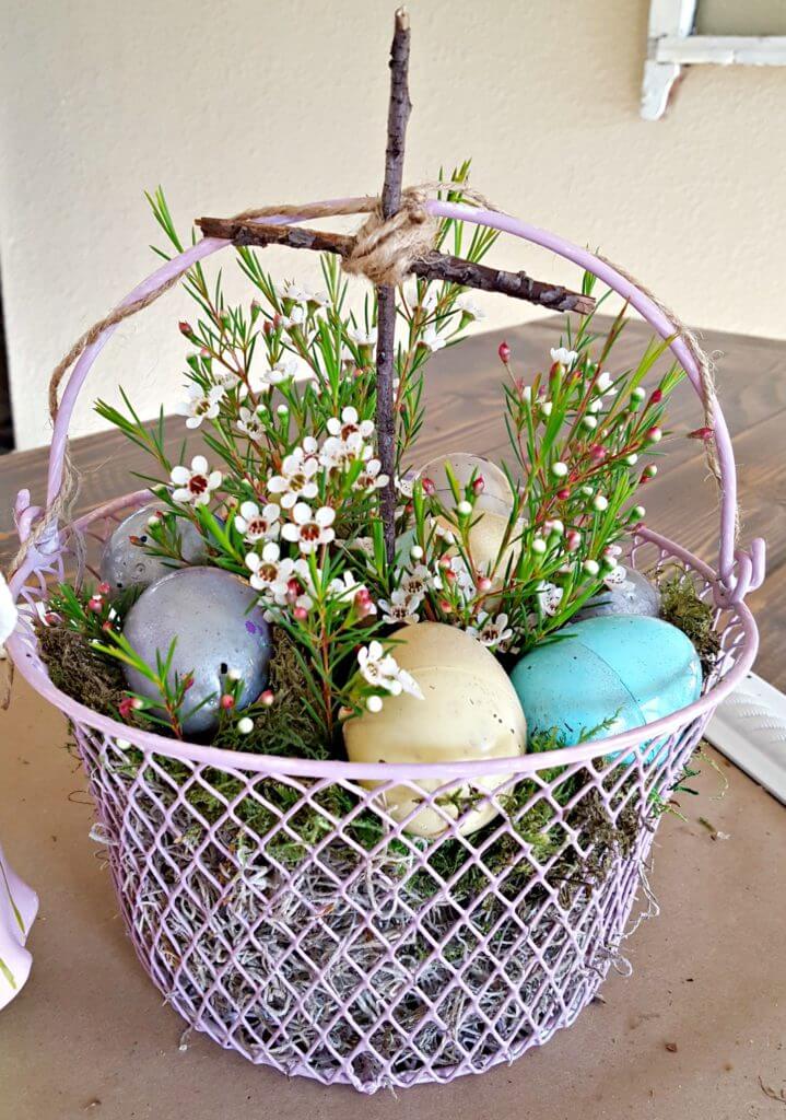 White Wire Basket with Stick Cross and Easter Decorations