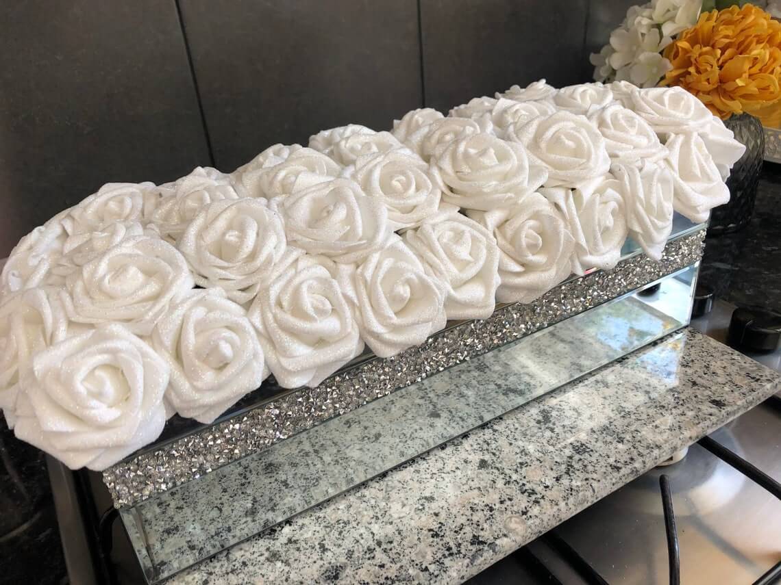 Mirrored Vase Overflowing with White Glitter Roses