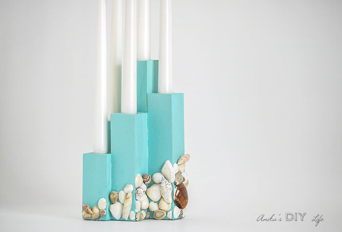 Coastal Skyscraper-Style Candlestick Holder Covered in Shells