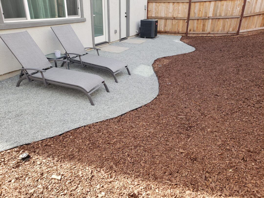 Mulch and Gravel Backyard Patio