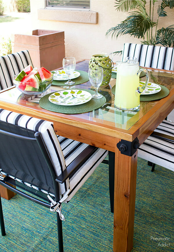Perfect Size Glass-Topped Outdoor Table for Four