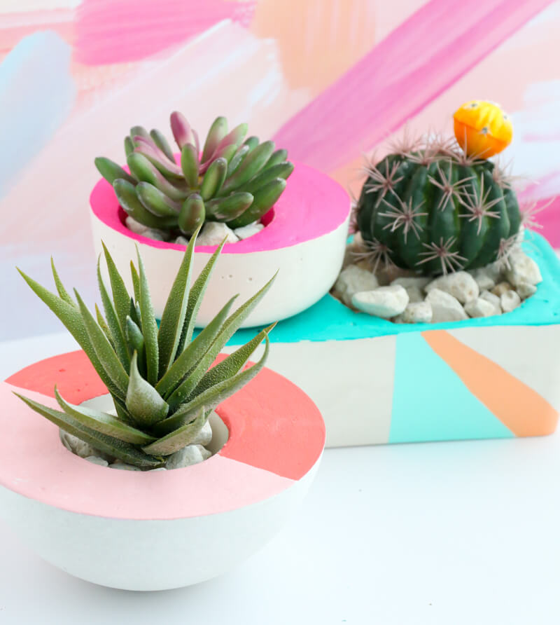 Colorful Asymmetrical Planters Made with White Concrete