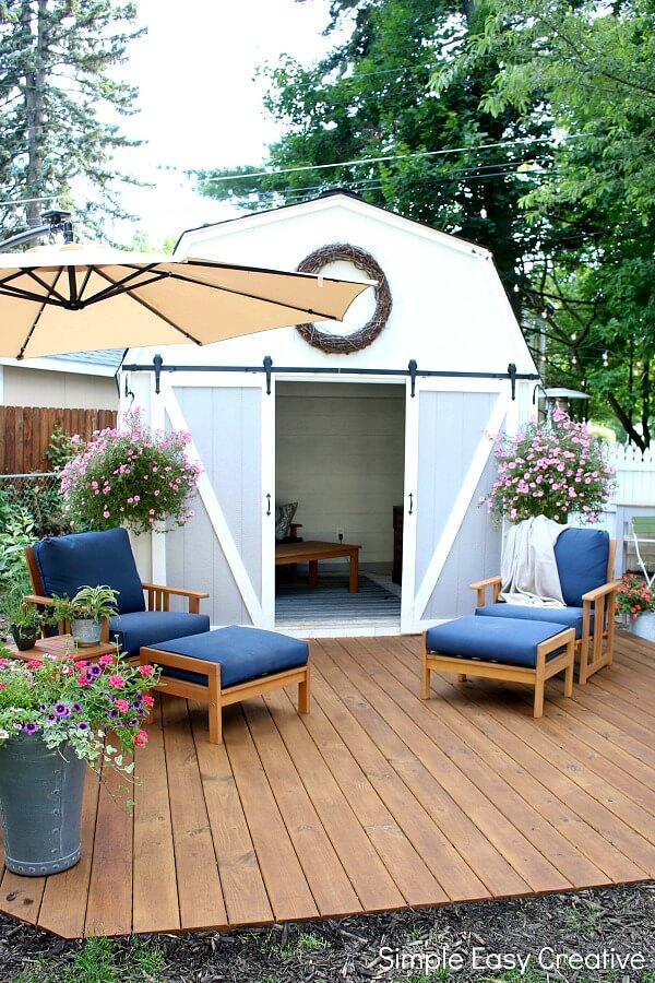 Backyard Deck Ideas: Ground Level Hexagon Shaped Wood Deck and Planter Boxes