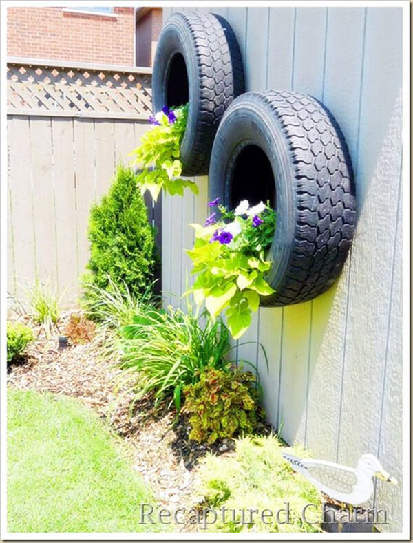 Blooming Tire Planter Mounted on the Wall