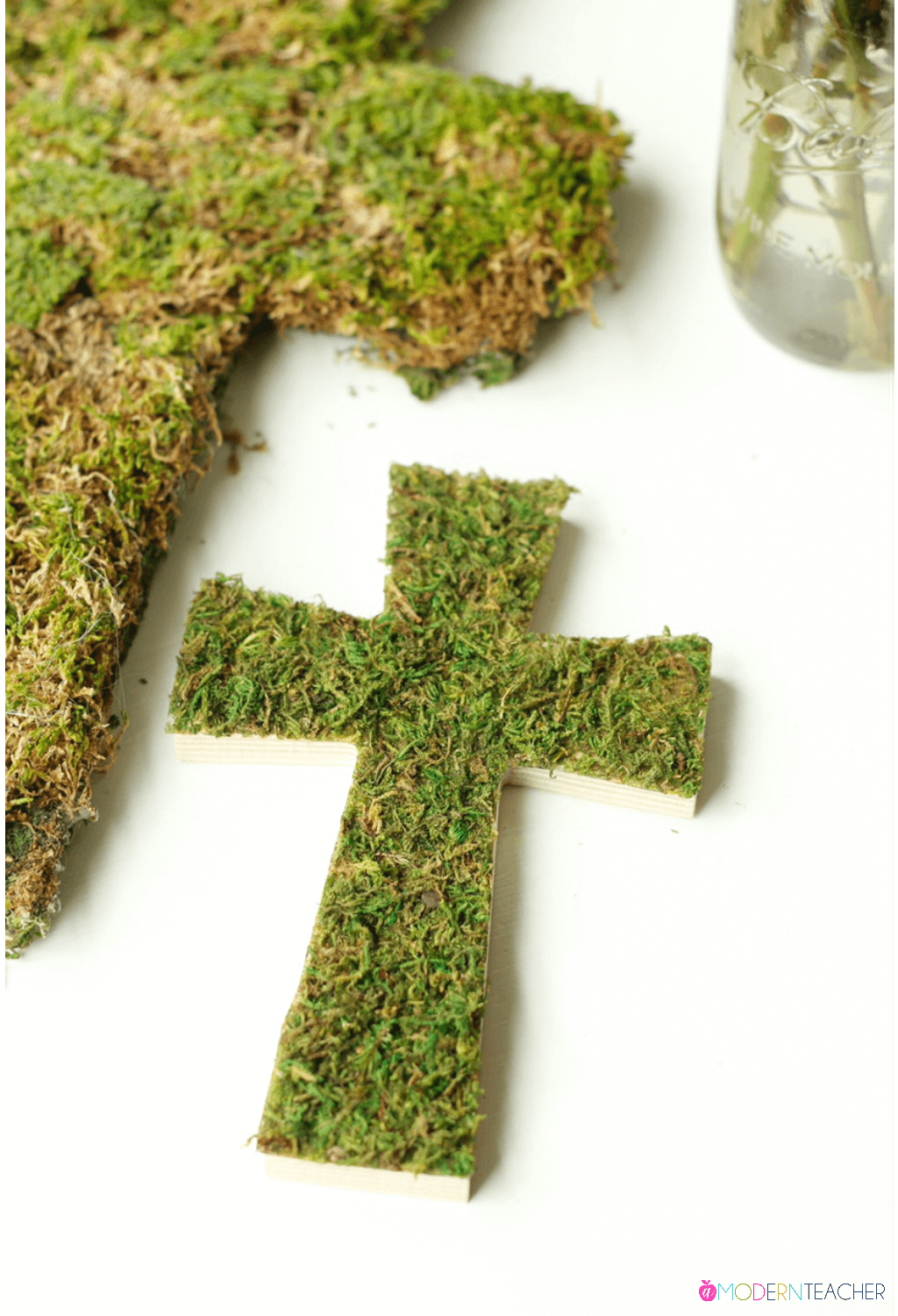Vivacious Cross Swathed in Faux Moss