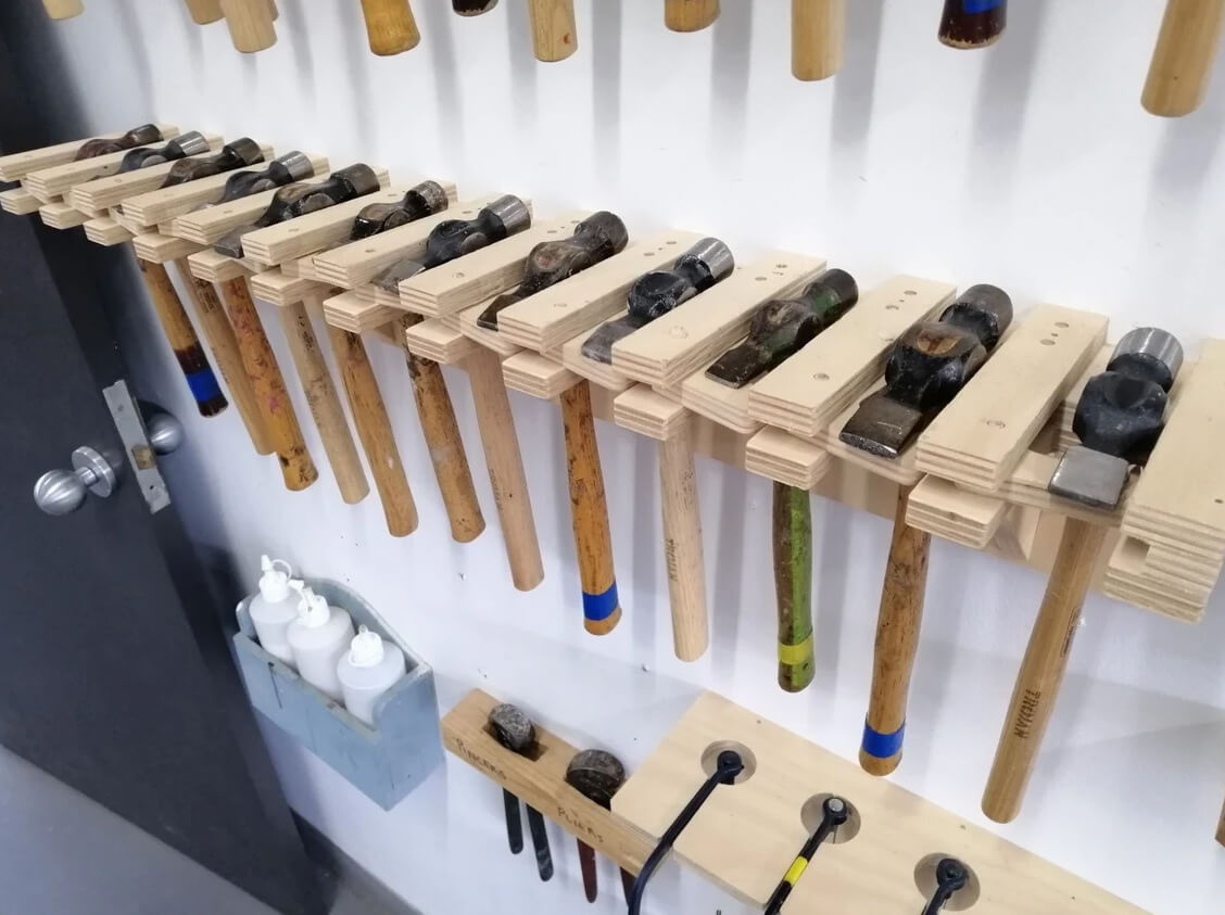 Hammer Organizer with Pivoting Supports